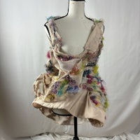 a mannequin with a colorful dress on it