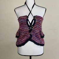 a mannequin mannequin wearing a knitted vest
