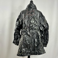 a black leather jacket on a mannequin