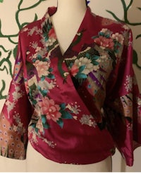 a pink silk kimono with a floral pattern