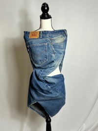 a mannequin wearing a pair of jeans