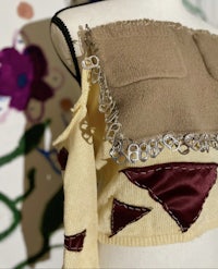 a mannequin with a sweater on it